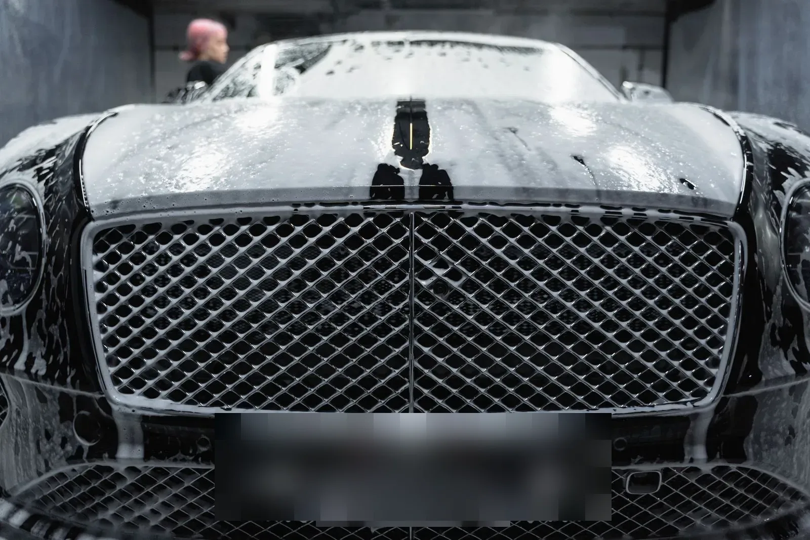 A clean car grille after a hand wash